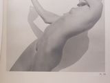 an image of a black and white photo of a nude woman