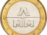 a close up of a coin on a white background