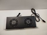 two fans that are attached to a wall
