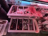 a lot of different items on the table in the room