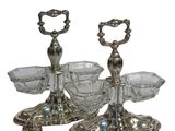 pair of silver plated candlesticks with cut glass holders