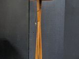 a lamp that is on a wooden stand in a room