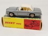 a toy car that is sitting on top of a box