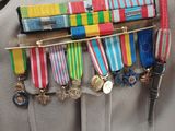 a bag with a bunch of medals in it