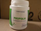 a bottle of propoliss sitting on a table
