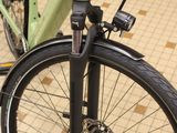 a bike that is parked on the floor in a room