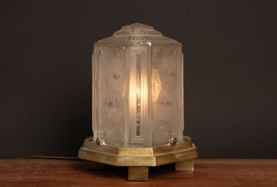 an image of a lamp that is on a table