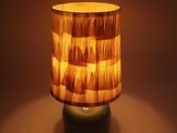 a lamp that is lit up on a table