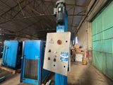 a machine that is sitting inside of a building