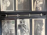 a black and white photo of a collection of old photos
