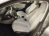 the interior of a car with white leather seats and black trims
