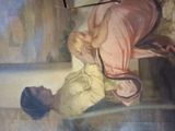 a painting of a woman holding a baby in her arms