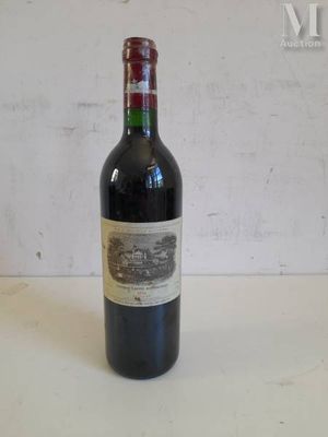 a bottle of wine that is sitting on a table