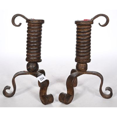 pair of antique cast iron candlesticks with scroll handles