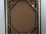 an old picture frame with a green border and a brown background