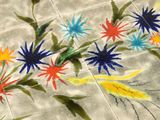 a picture of a tile with flowers painted on it