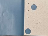 an open book with a picture of circles on it