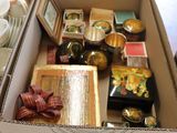 a box full of assorted items sitting on a table