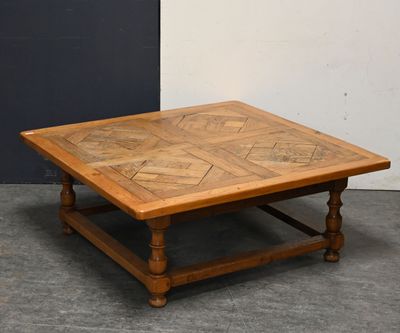 an image of a wooden coffee table with a tile top