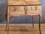 an old wooden desk with two drawers and a drawer on top of it