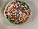 a small plate with a design on it on a table