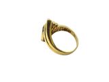 a close up of a gold ring on a white background