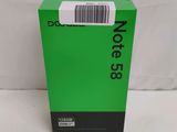 a close up of a green box with a barcode on it