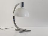 an image of a white table lamp on a white surface