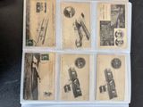 a picture of a collection of old postcards on a table