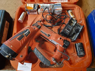 a tool kit in a plastic case on the floor