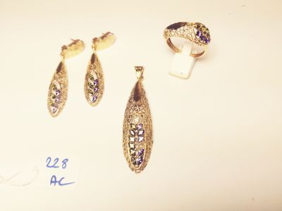 three different types of jewelry are displayed on a white surface