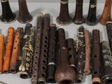 a lot of musical instruments that are sitting on a table
