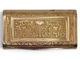 an image of a gold metal business card case on a white background