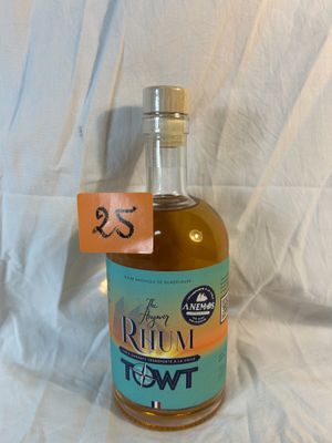 a bottle of rum that is sitting on a table