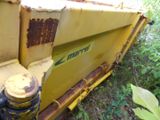 a close up view of a yellow dump truck