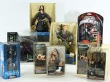 many action figures that are in the package