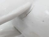 a close up view of a white porcelain object