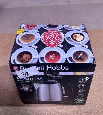 une boîte de café posée par terre