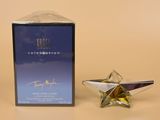 angel celebration eap spray bottle next to a box of perfume