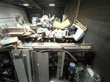 a room with a lot of clutter in it