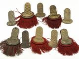 several different types of brushes are lined up on a white surface