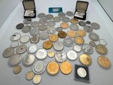 a lot of coins that are sitting on a table