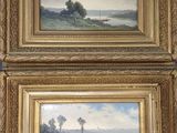 two framed paintings of a landscape with a river and trees