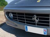 a ferrari badge on the front of a sports car