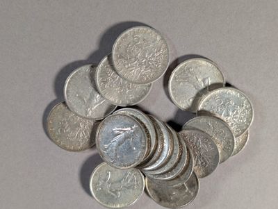 a pile of coins sitting on top of a table