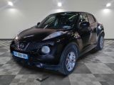 a picture of a black nissan juke suv parked in a garage