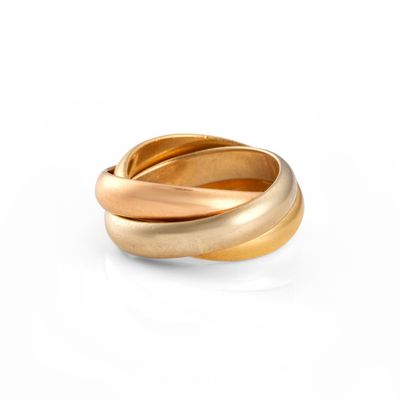an image of a close up of a gold ring on a white surface