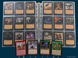 a lot of cards that are in a binder
