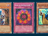 three cards of different colors and designs on a blue background