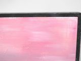 painting of a pink and black abstract painting on a white wall